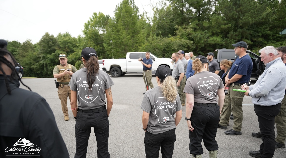 (Georgia Department of Agriculture Law Enforcement, Catoosa County AC, Murray County AC, Walker County AC, and Atlanta Humane Society Staff at staging point ahead of operation. Phone Credit: Catoosa County AC)