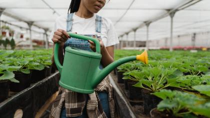 Woman with Watering Can