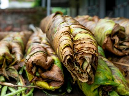 Ripe tobacco leaves heaped on market